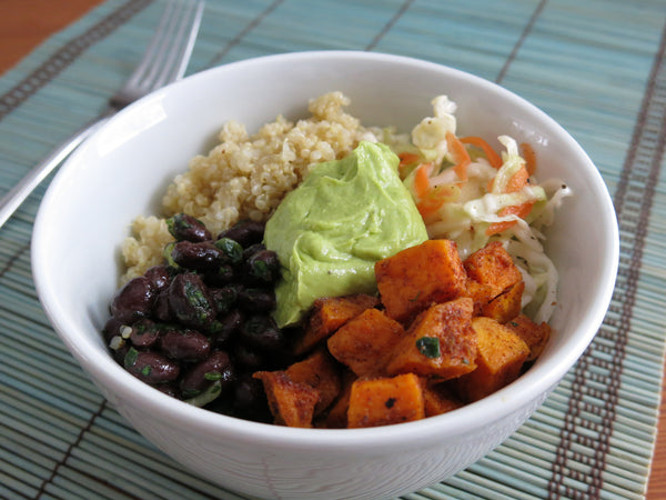 Quinoa Bowl with Sweet Potato, Marinated Cabbage, Black Beans and Avocado